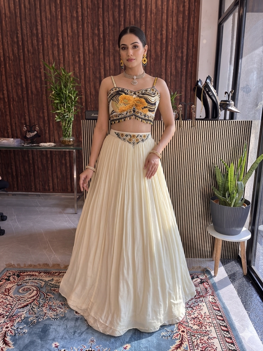 Ivory Pleated Georgette Lehenga with Sunflower Embroidered Bustier